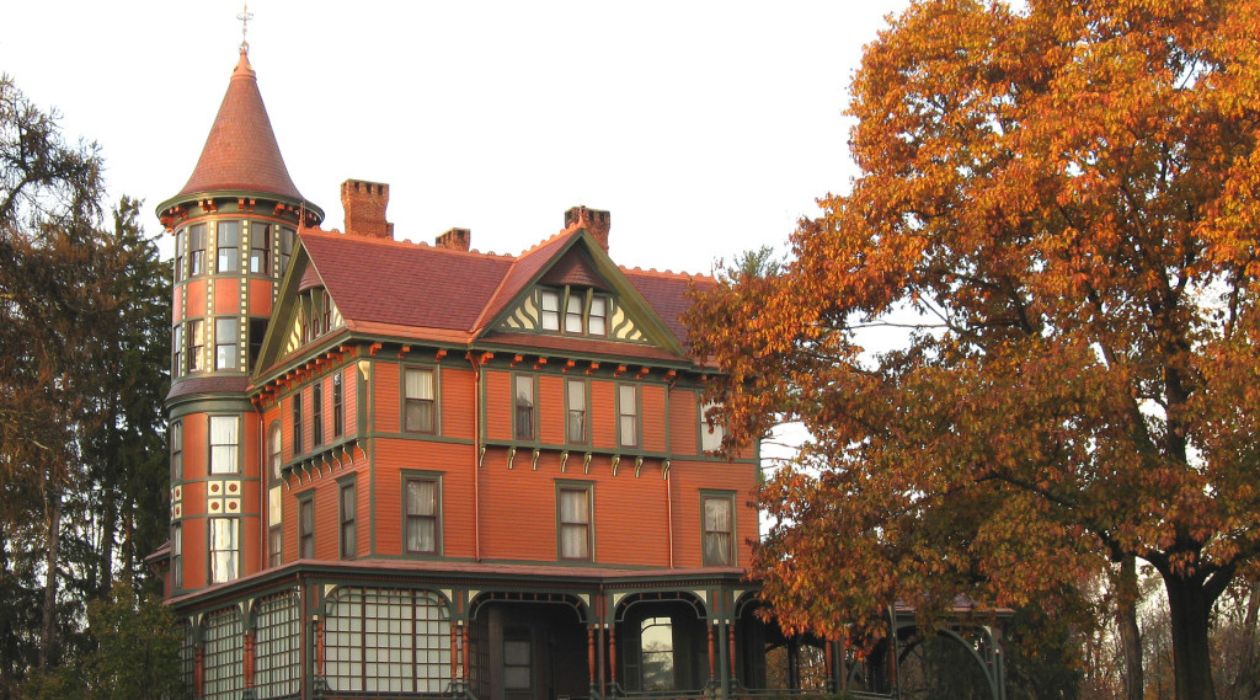 The exterior of the mansion at Wilderstein Historic Site in Rhinebeck surrounded by fall foliage